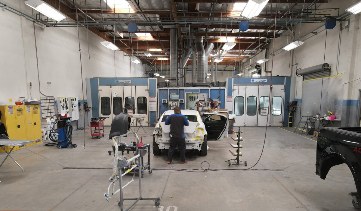 The main repair floor and paint booths at Tony's Body Shop collision center in Oxnard, California